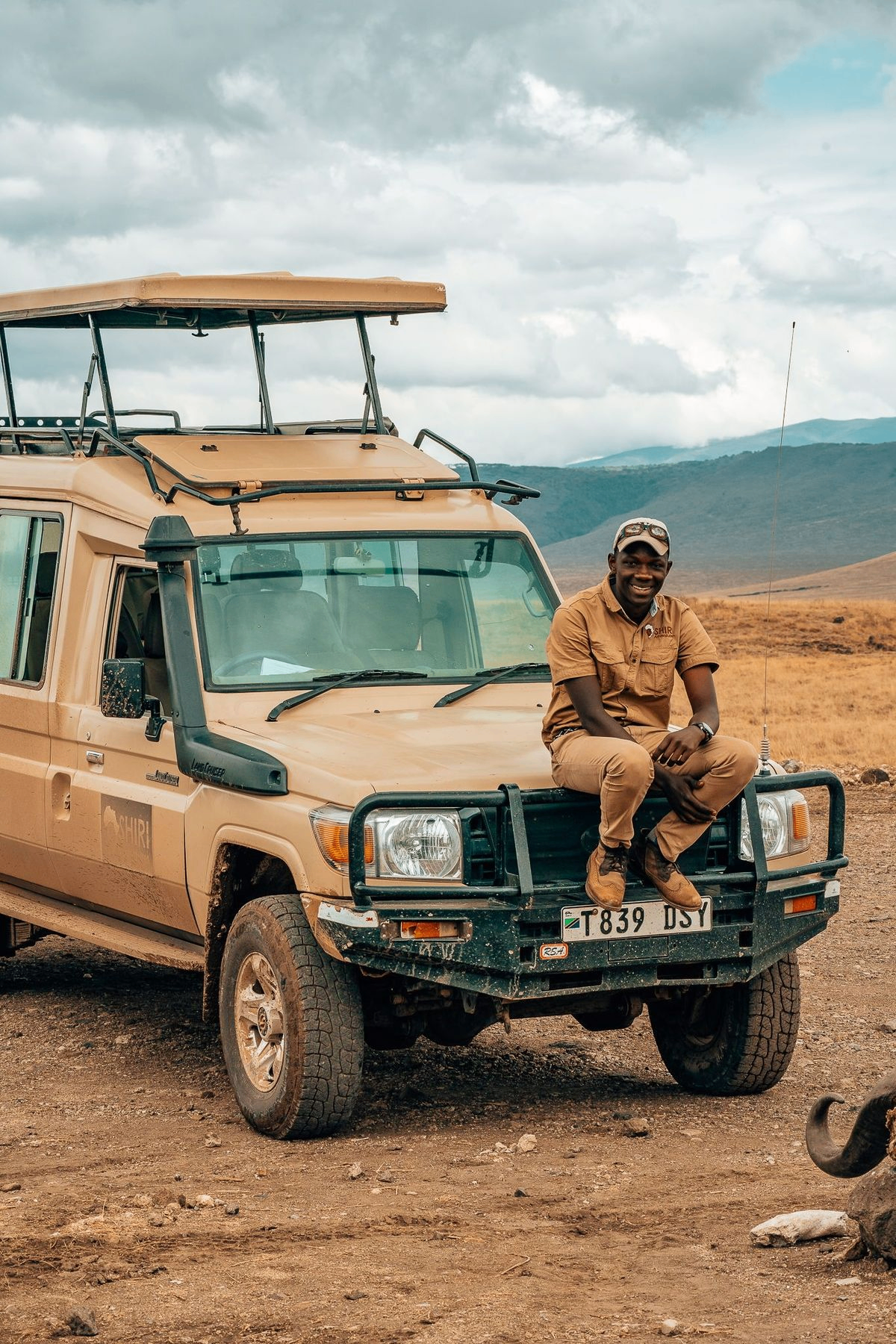 Augustine Nzungu on safari with a Land Cruiser in the Ngorongoro Crater